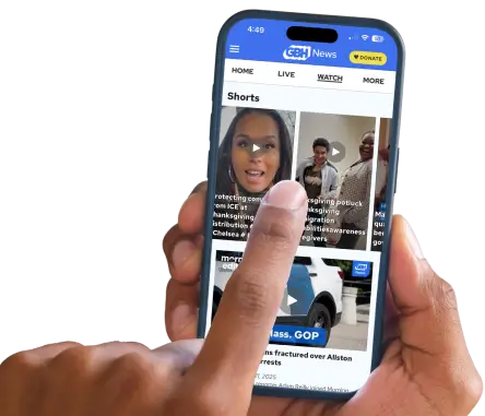 image of a hand holding an iPhone